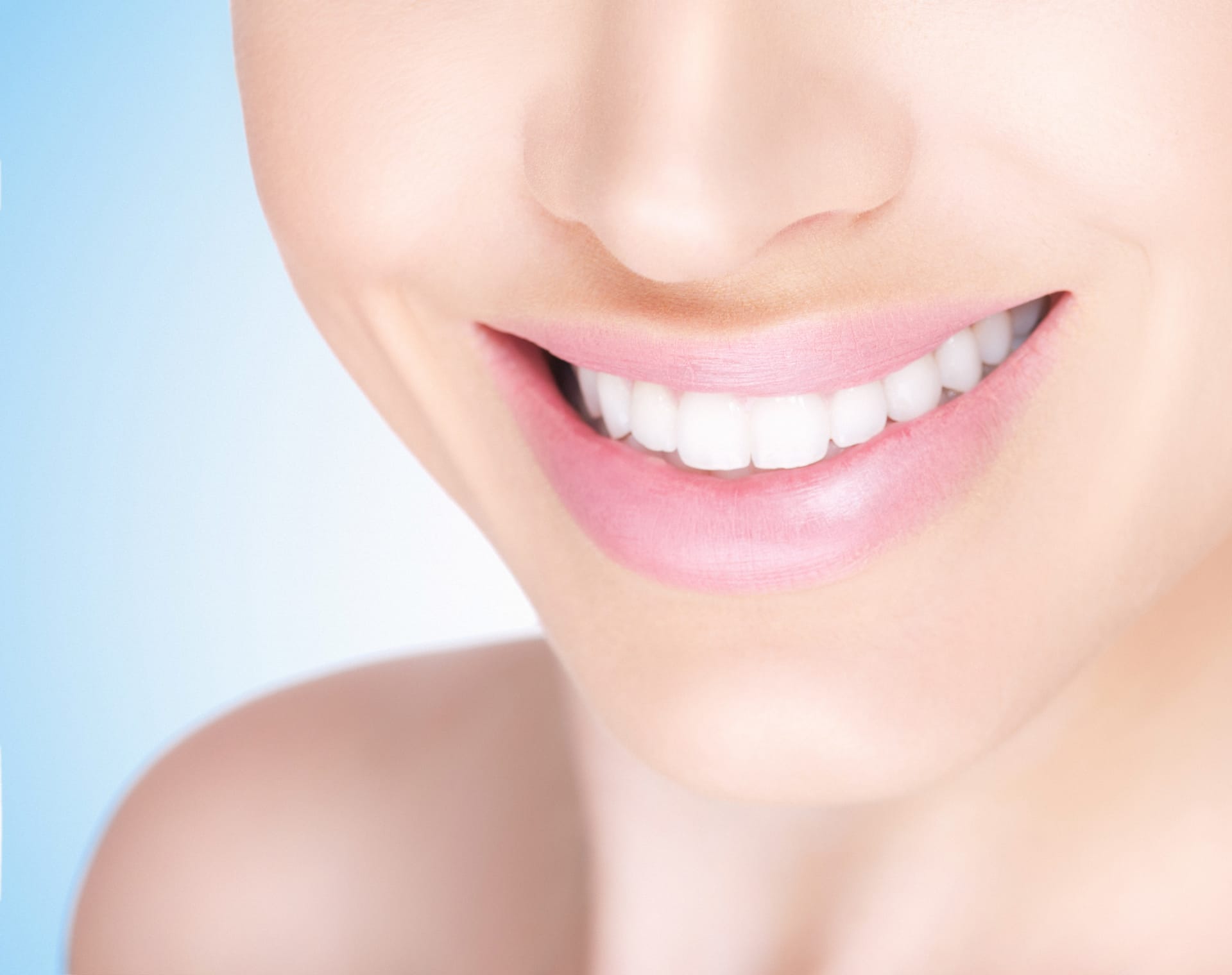 Close-up of a smile with white teeth